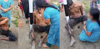চুরির অভিযোগে আটক ক্ষুধার্ত বাবার মুখে রুটি তুলে দিচ্ছে মেয়ে